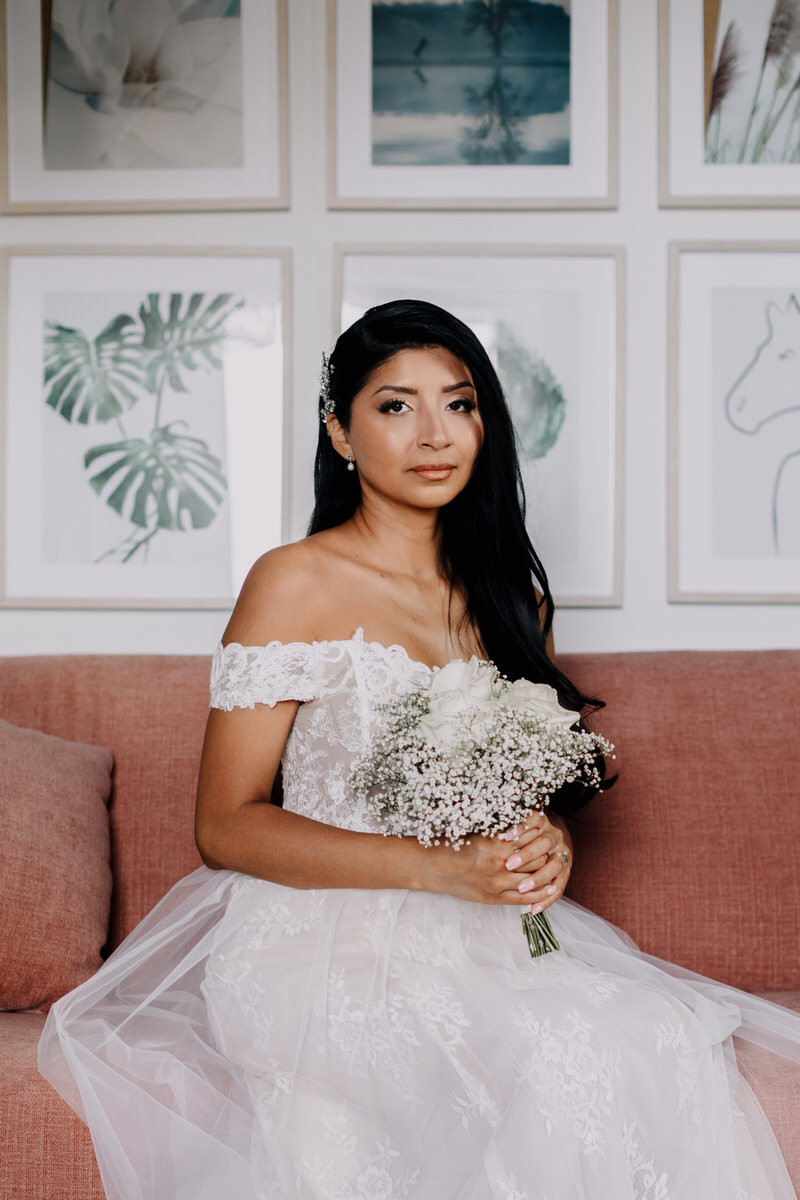 Bride with a beautiful wedding dress and a bridal bouquet in Stockholm.